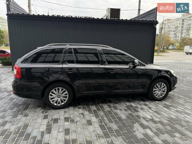 Шкода Октавія 2012 у Полтаві на Automoto.ua Чорний Шкода Октавія, об'ємом двигуна 1.6 л та пробігом 189 тис. км за 8800 $, фото 44 на Automoto.ua
