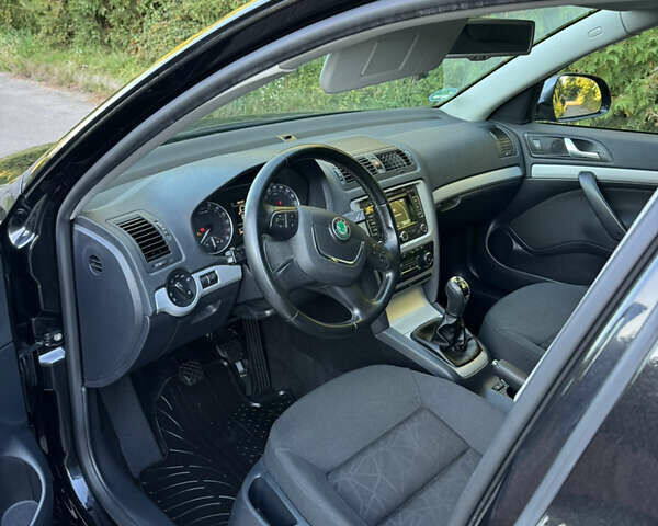 Шкода Октавия 2012 в Ровно на Automoto.ua Черный Шкода Октавия, объемом двигателя 1.6 л и пробегом 181 тыс. км за 9750 $, фото 24 на Automoto.ua