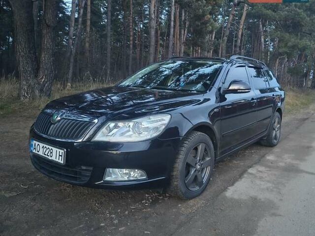 Черный Шкода Октавия, объемом двигателя 2 л и пробегом 139 тыс. км за 13499 $, фото 1 на Automoto.ua