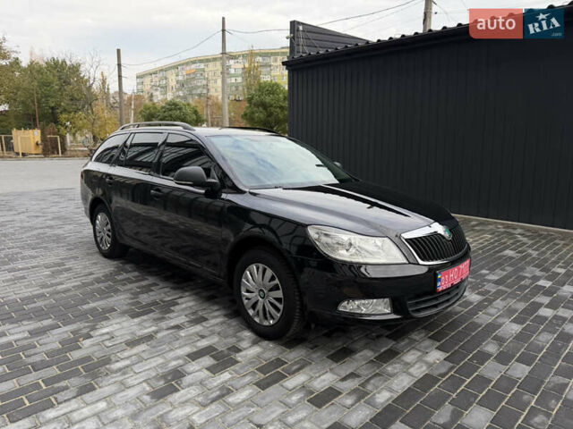 Шкода Октавія 2012 у Полтаві на Automoto.ua Чорний Шкода Октавія, об'ємом двигуна 1.6 л та пробігом 189 тис. км за 8800 $, фото 52 на Automoto.ua