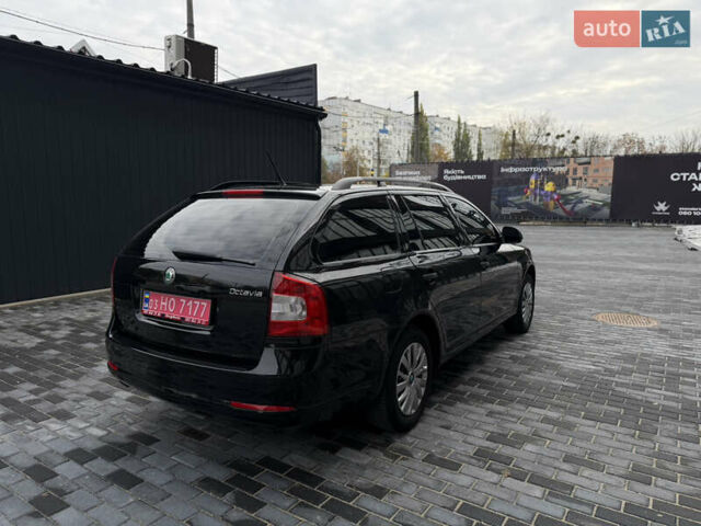 Шкода Октавія 2012 у Полтаві на Automoto.ua Чорний Шкода Октавія, об'ємом двигуна 1.6 л та пробігом 189 тис. км за 8800 $, фото 38 на Automoto.ua