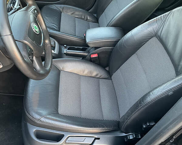 Черный Шкода Октавия, объемом двигателя 2 л и пробегом 251 тыс. км за 10850 $, фото 78 на Automoto.ua