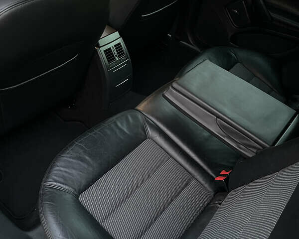 Чорний Шкода Октавія, об'ємом двигуна 2 л та пробігом 228 тис. км за 10799 $, фото 81 на Automoto.ua