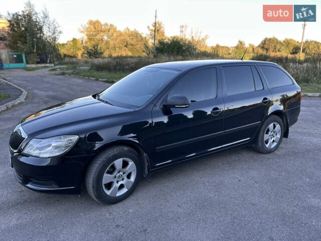 Черный Шкода Октавия, объемом двигателя 1.6 л и пробегом 209 тыс. км за 8500 $, фото 1 на Automoto.ua