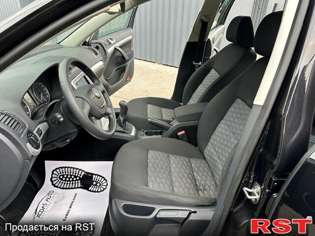 Черный Шкода Октавия, объемом двигателя 1.8 л и пробегом 172 тыс. км за 9400 $, фото 7 на Automoto.ua