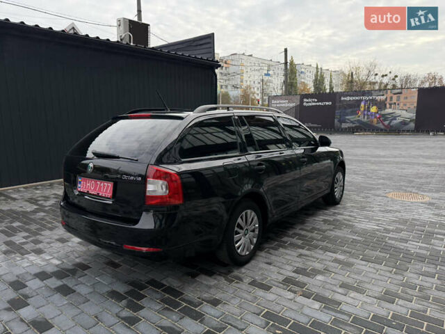 Шкода Октавія 2012 у Полтаві на Automoto.ua Чорний Шкода Октавія, об'ємом двигуна 1.6 л та пробігом 189 тис. км за 8800 $, фото 39 на Automoto.ua