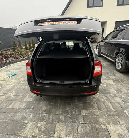 Чорний Шкода Октавія, об'ємом двигуна 1.8 л та пробігом 247 тис. км за 7499 $, фото 6 на Automoto.ua