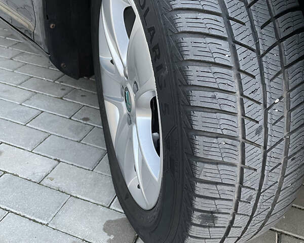 Чорний Шкода Октавія, об'ємом двигуна 2 л та пробігом 228 тис. км за 10799 $, фото 46 на Automoto.ua