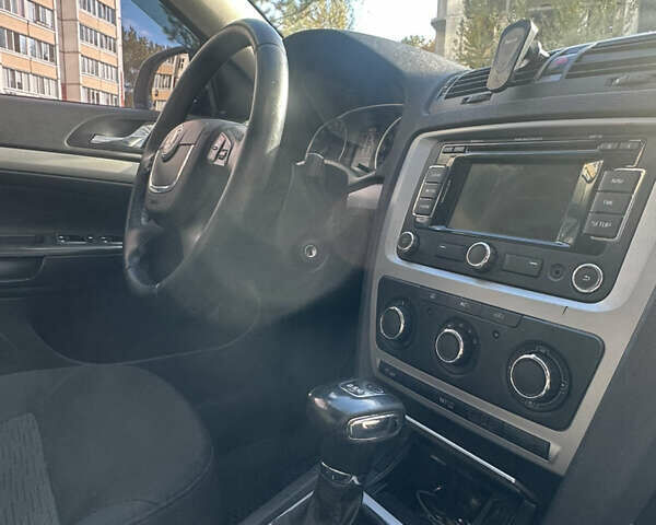 Шкода Октавия 2012 в Киеве на Automoto.ua Черный Шкода Октавия, объемом двигателя 1.6 л и пробегом 283 тыс. км за 8990 $, фото 13 на Automoto.ua