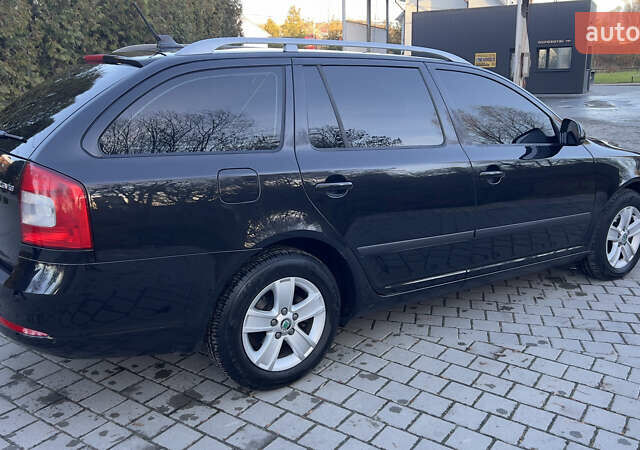 Черный Шкода Октавия, объемом двигателя 1.6 л и пробегом 290 тыс. км за 7900 $, фото 1 на Automoto.ua