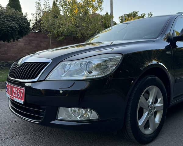 Шкода Октавия 2012 в Ровно на Automoto.ua Черный Шкода Октавия, объемом двигателя 1.6 л и пробегом 181 тыс. км за 9750 $, фото 12 на Automoto.ua