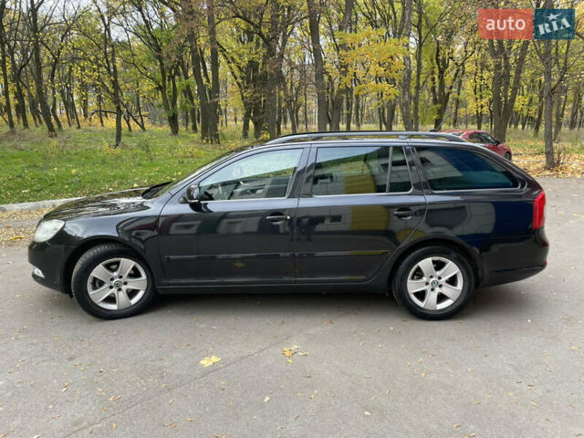 Черный Шкода Октавия, объемом двигателя 1.39 л и пробегом 212 тыс. км за 7777 $, фото 1 на Automoto.ua