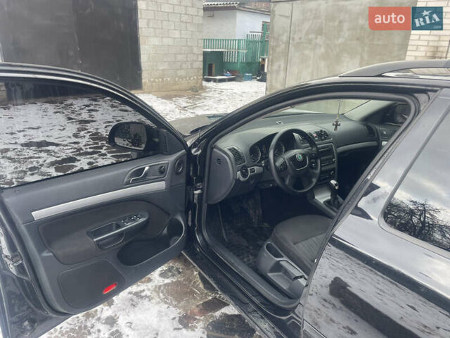 Черный Шкода Октавия, объемом двигателя 1.6 л и пробегом 325 тыс. км за 8500 $, фото 12 на Automoto.ua