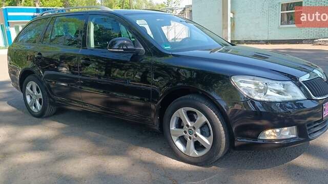 Черный Шкода Октавия, объемом двигателя 2 л и пробегом 201 тыс. км за 11200 $, фото 2 на Automoto.ua