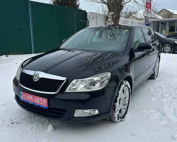 Черный Шкода Октавия, объемом двигателя 1.8 л и пробегом 193 тыс. км за 9000 $, фото 1 на Automoto.ua