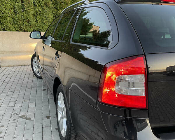 Чорний Шкода Октавія, об'ємом двигуна 2 л та пробігом 228 тис. км за 10799 $, фото 18 на Automoto.ua