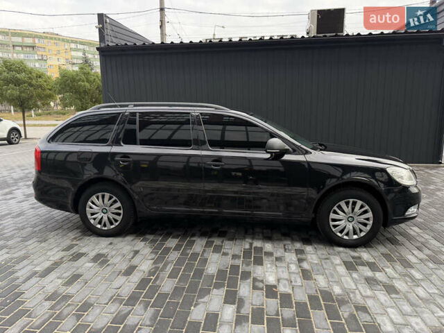 Шкода Октавія 2012 у Полтаві на Automoto.ua Чорний Шкода Октавія, об'ємом двигуна 1.6 л та пробігом 189 тис. км за 8800 $, фото 47 на Automoto.ua
