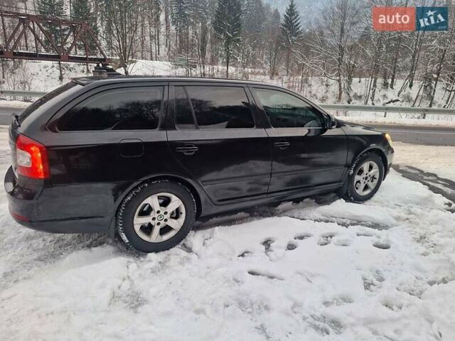 Чорний Шкода Октавія, об'ємом двигуна 2 л та пробігом 322 тис. км за 9300 $, фото 3 на Automoto.ua