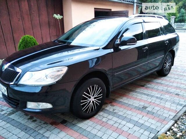 Черный Шкода Октавия, объемом двигателя 2 л и пробегом 420 тыс. км за 9500 $, фото 1 на Automoto.ua