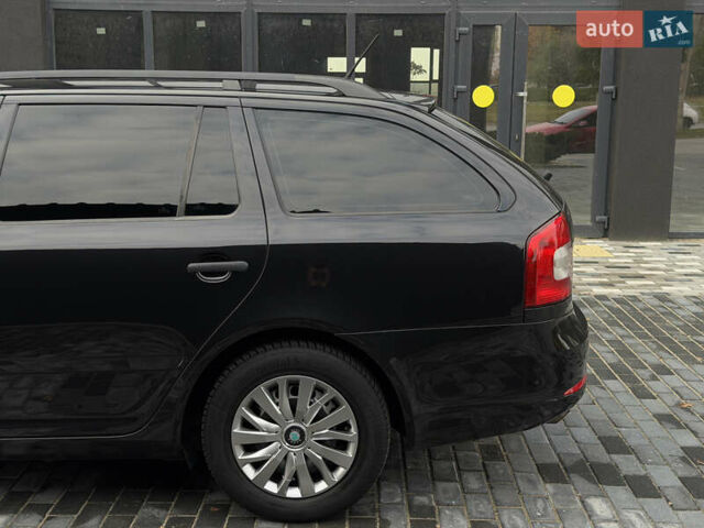 Шкода Октавія 2012 у Полтаві на Automoto.ua Чорний Шкода Октавія, об'ємом двигуна 1.6 л та пробігом 189 тис. км за 8800 $, фото 63 на Automoto.ua