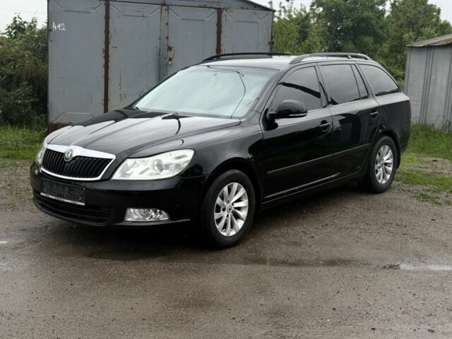 Черный Шкода Октавия, объемом двигателя 1.6 л и пробегом 235 тыс. км за 7650 $, фото 1 на Automoto.ua