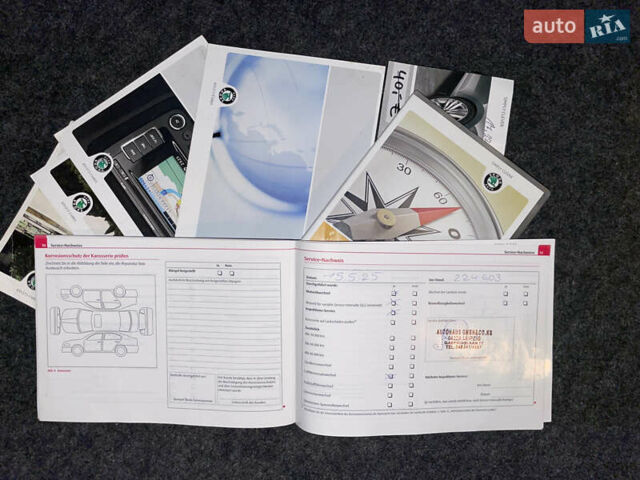 Чорний Шкода Октавія, об'ємом двигуна 2 л та пробігом 228 тис. км за 10799 $, фото 129 на Automoto.ua