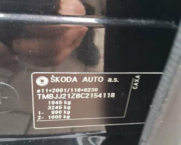 Черный Шкода Октавия, объемом двигателя 1.4 л и пробегом 232 тыс. км за 7900 $, фото 12 на Automoto.ua