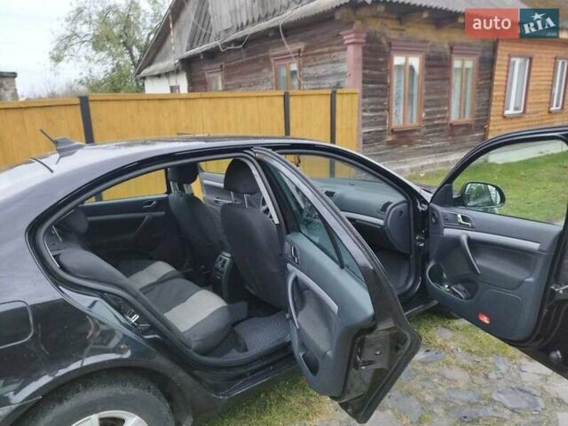 Черный Шкода Октавия, объемом двигателя 1.6 л и пробегом 320 тыс. км за 7200 $, фото 4 на Automoto.ua