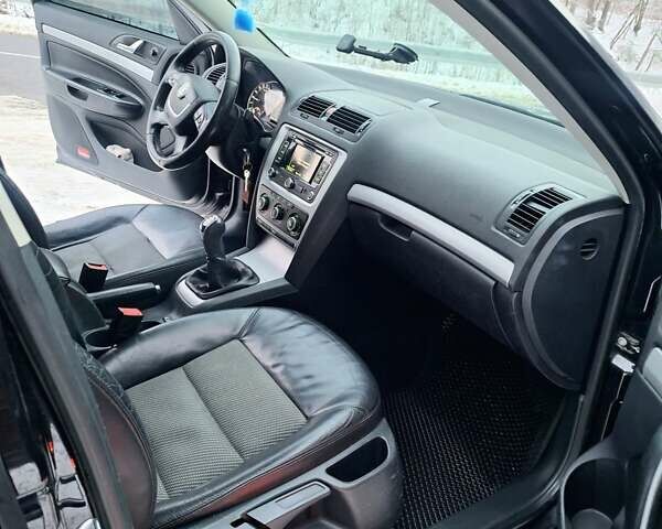 Чорний Шкода Октавія, об'ємом двигуна 2 л та пробігом 322 тис. км за 9300 $, фото 12 на Automoto.ua