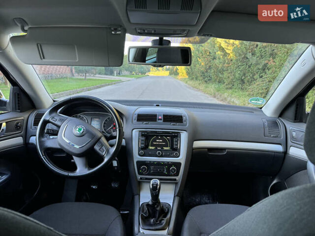 Шкода Октавия 2012 в Ровно на Automoto.ua Черный Шкода Октавия, объемом двигателя 1.6 л и пробегом 181 тыс. км за 9750 $, фото 26 на Automoto.ua