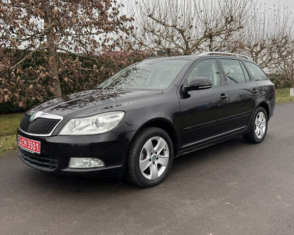 Черный Шкода Октавия, объемом двигателя 2 л и пробегом 196 тыс. км за 9700 $, фото 1 на Automoto.ua