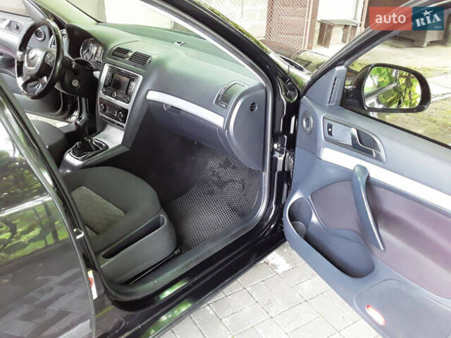 Чорний Шкода Октавія, об'ємом двигуна 1.6 л та пробігом 282 тис. км за 7199 $, фото 26 на Automoto.ua