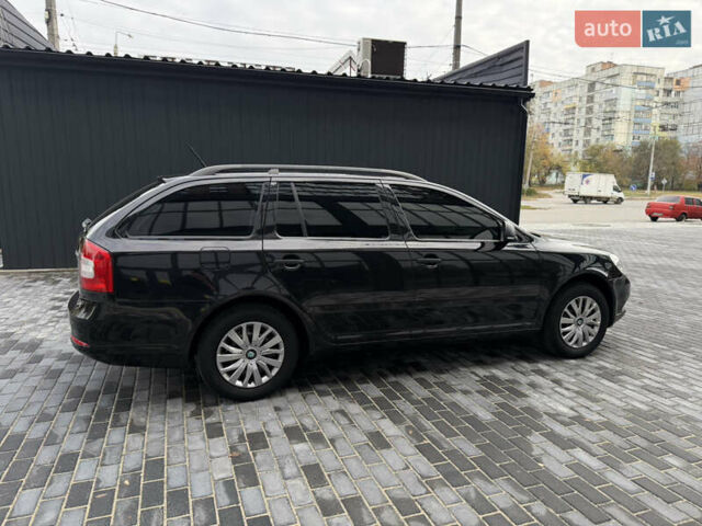 Шкода Октавія 2012 у Полтаві на Automoto.ua Чорний Шкода Октавія, об'ємом двигуна 1.6 л та пробігом 189 тис. км за 8800 $, фото 43 на Automoto.ua