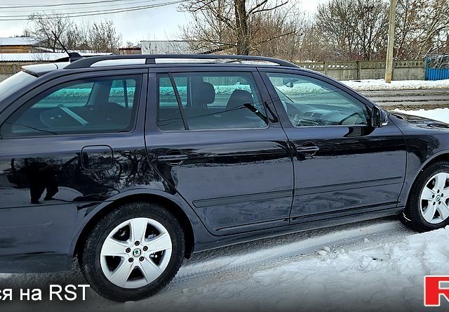 Черный Шкода Октавия, объемом двигателя 2 л и пробегом 153 тыс. км за 7800 $, фото 1 на Automoto.ua
