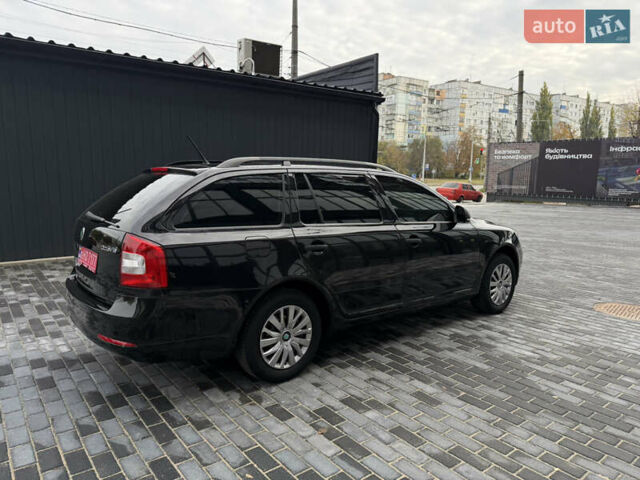 Шкода Октавія 2012 у Полтаві на Automoto.ua Чорний Шкода Октавія, об'ємом двигуна 1.6 л та пробігом 189 тис. км за 8800 $, фото 41 на Automoto.ua