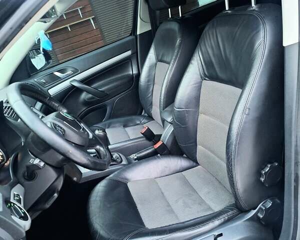 Чорний Шкода Октавія, об'ємом двигуна 2 л та пробігом 322 тис. км за 9300 $, фото 1 на Automoto.ua