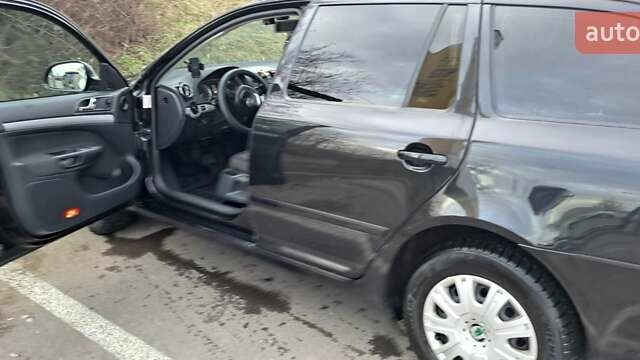 Черный Шкода Октавия, объемом двигателя 2 л и пробегом 329 тыс. км за 8000 $, фото 8 на Automoto.ua