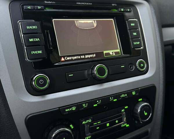 Шкода Октавия 2012 в Ровно на Automoto.ua Черный Шкода Октавия, объемом двигателя 1.6 л и пробегом 181 тыс. км за 9750 $, фото 35 на Automoto.ua