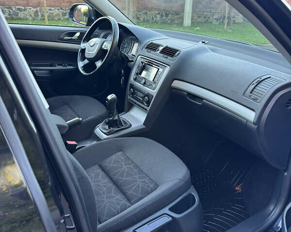 Шкода Октавия 2012 в Ровно на Automoto.ua Черный Шкода Октавия, объемом двигателя 1.6 л и пробегом 181 тыс. км за 9750 $, фото 25 на Automoto.ua