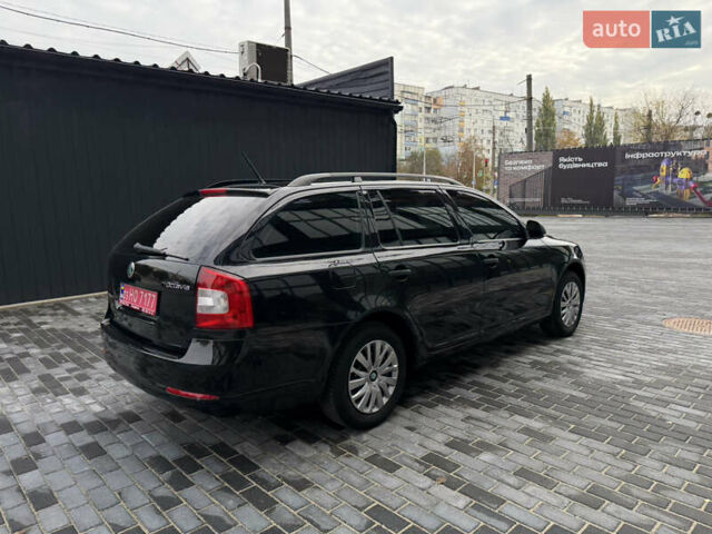 Шкода Октавія 2012 у Полтаві на Automoto.ua Чорний Шкода Октавія, об'ємом двигуна 1.6 л та пробігом 189 тис. км за 8800 $, фото 40 на Automoto.ua