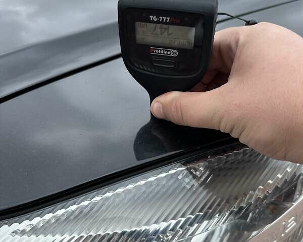 Черный Шкода Октавия, объемом двигателя 2 л и пробегом 210 тыс. км за 11600 $, фото 63 на Automoto.ua