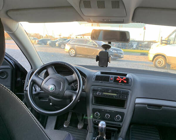 Шкода Октавія 2012 у Львові на Automoto.ua Чорний Шкода Октавія, об'ємом двигуна 1.6 л та пробігом 242 тис. км за 6500 $, фото 16 на Automoto.ua