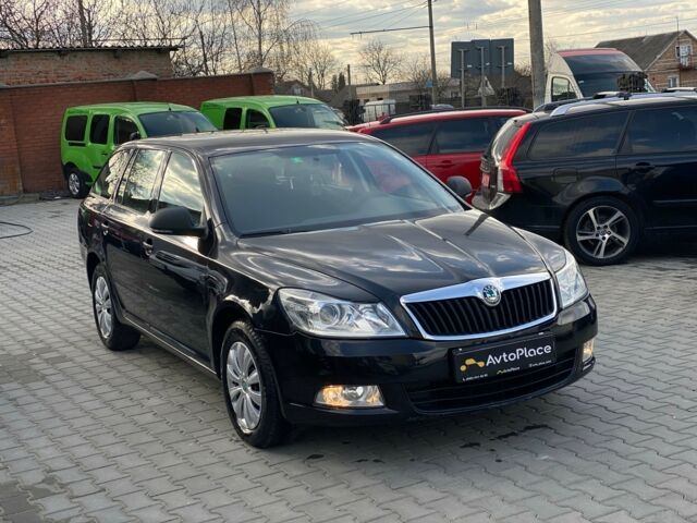 Чорний Шкода Октавія, об'ємом двигуна 1.6 л та пробігом 242 тис. км за 8799 $, фото 6 на Automoto.ua