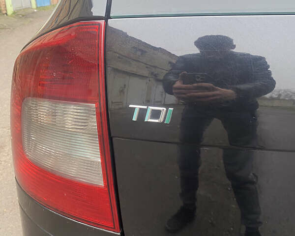 Чорний Шкода Октавія, об'ємом двигуна 1.6 л та пробігом 236 тис. км за 9000 $, фото 13 на Automoto.ua