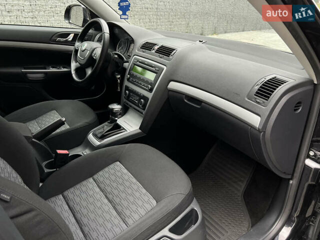 Чорний Шкода Октавія, об'ємом двигуна 1.8 л та пробігом 195 тис. км за 8900 $, фото 34 на Automoto.ua