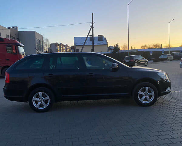 Чорний Шкода Октавія, об'ємом двигуна 2 л та пробігом 252 тис. км за 9770 $, фото 2 на Automoto.ua