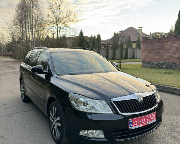 Черный Шкода Октавия, объемом двигателя 2 л и пробегом 217 тыс. км за 10550 $, фото 6 на Automoto.ua