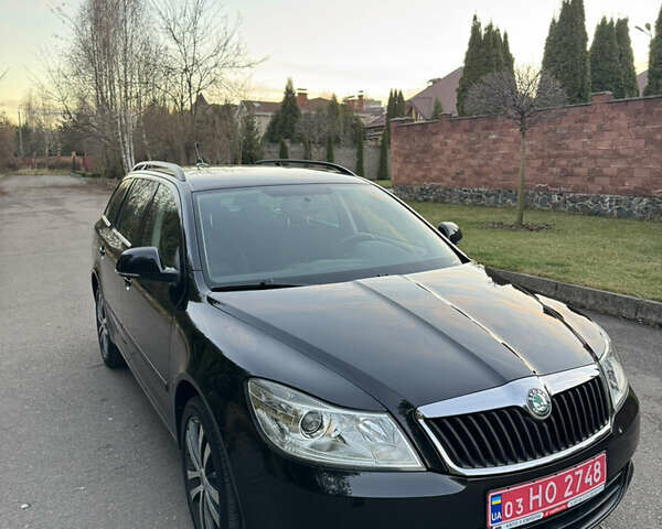 Черный Шкода Октавия, объемом двигателя 2 л и пробегом 217 тыс. км за 10550 $, фото 18 на Automoto.ua