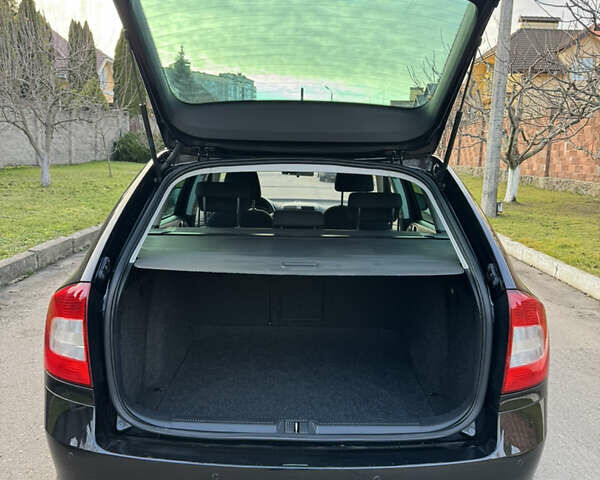 Черный Шкода Октавия, объемом двигателя 2 л и пробегом 217 тыс. км за 10550 $, фото 67 на Automoto.ua