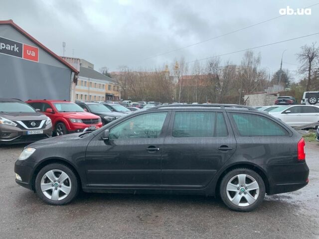 Чорний Шкода Октавія, об'ємом двигуна 1.6 л та пробігом 205 тис. км за 9290 $, фото 7 на Automoto.ua